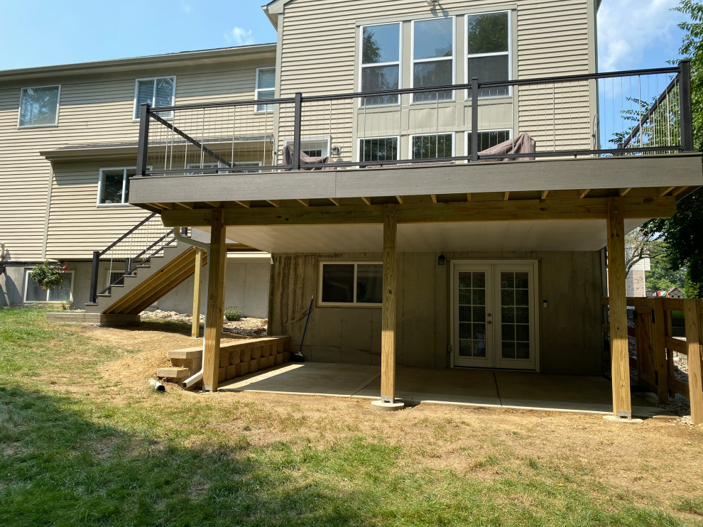 Deck - large transitional backyard second story metal railing deck idea in Cincinnati