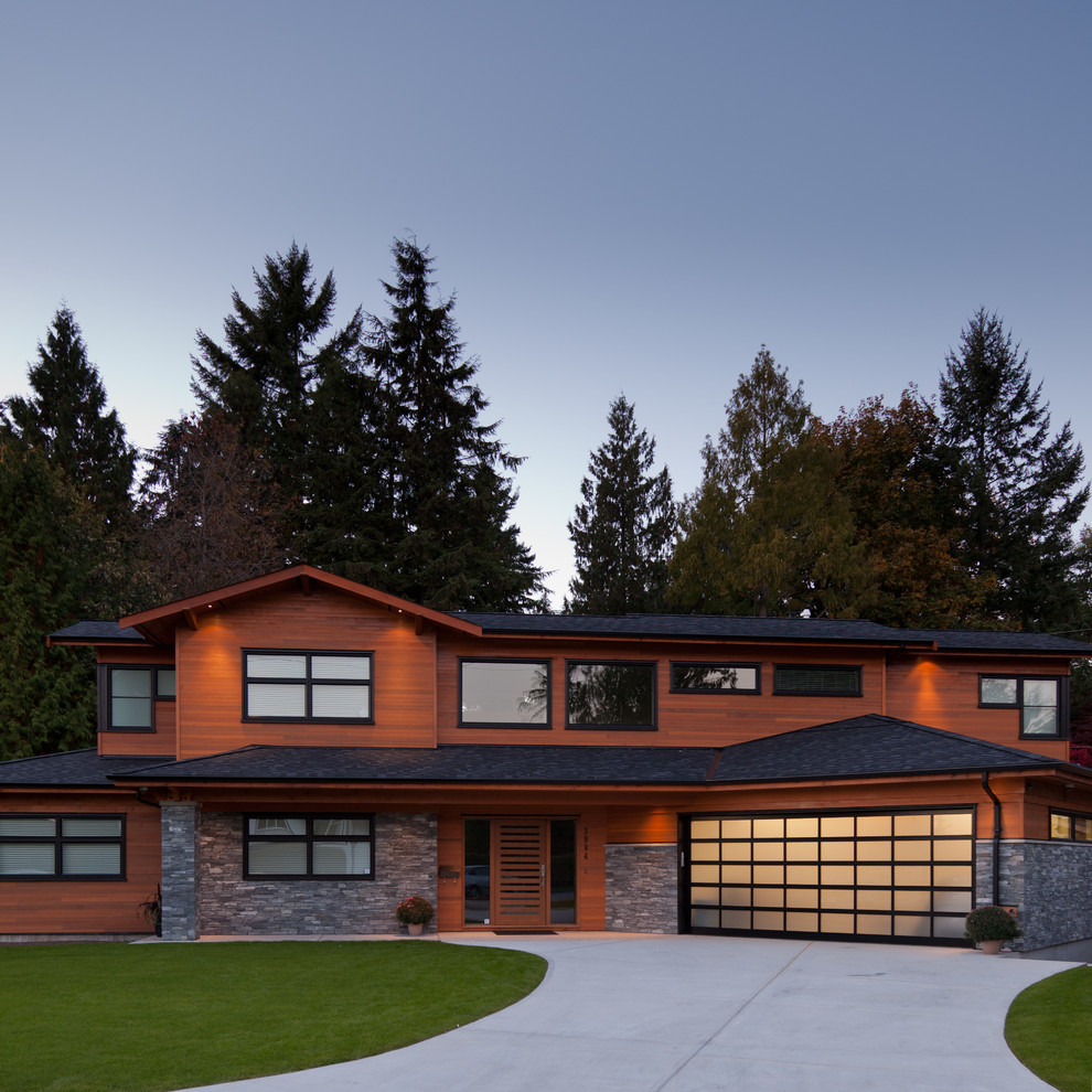 Design ideas for a contemporary exterior in Vancouver with wood siding.