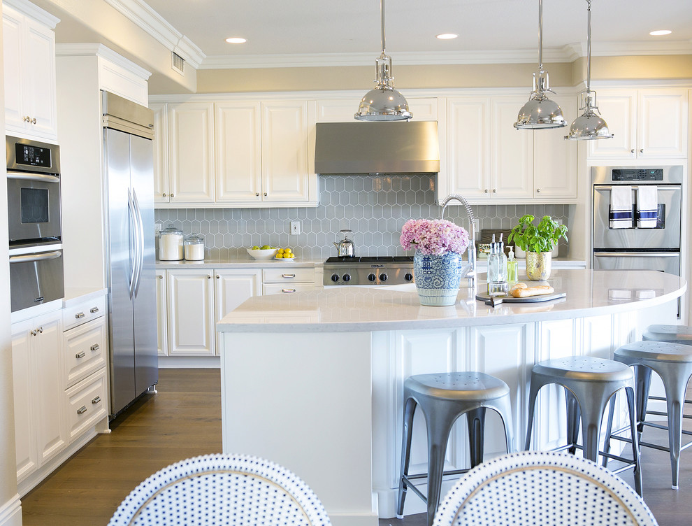 Inspiration for a large transitional kitchen in Orange County with with island.