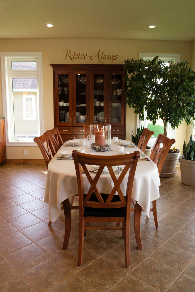 Mid-sized transitional porcelain tile great room photo with beige walls, a standard fireplace and a tile fireplace