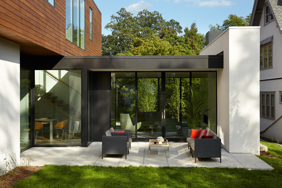 Design ideas for a modern backyard patio in Minneapolis.