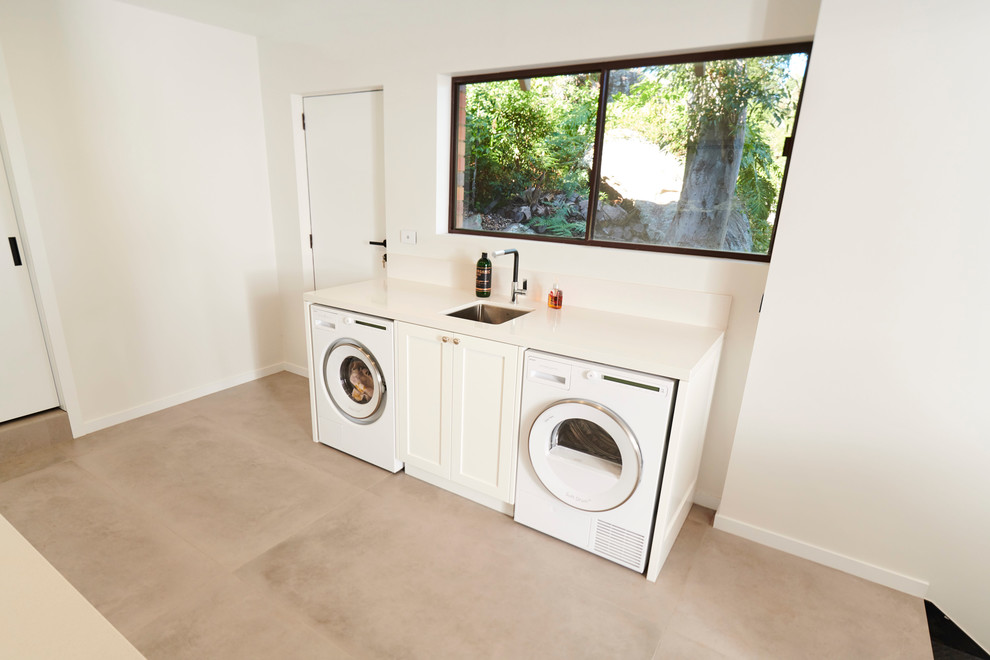 Photo of a contemporary laundry room in Sydney.