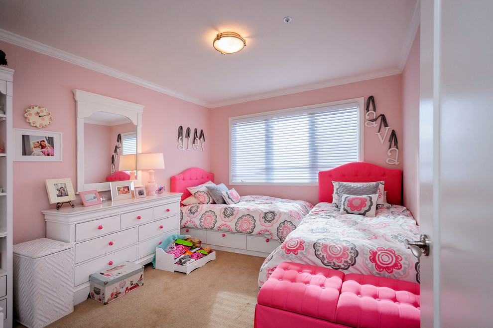 This is an example of a traditional kids' room in San Francisco with pink walls.
