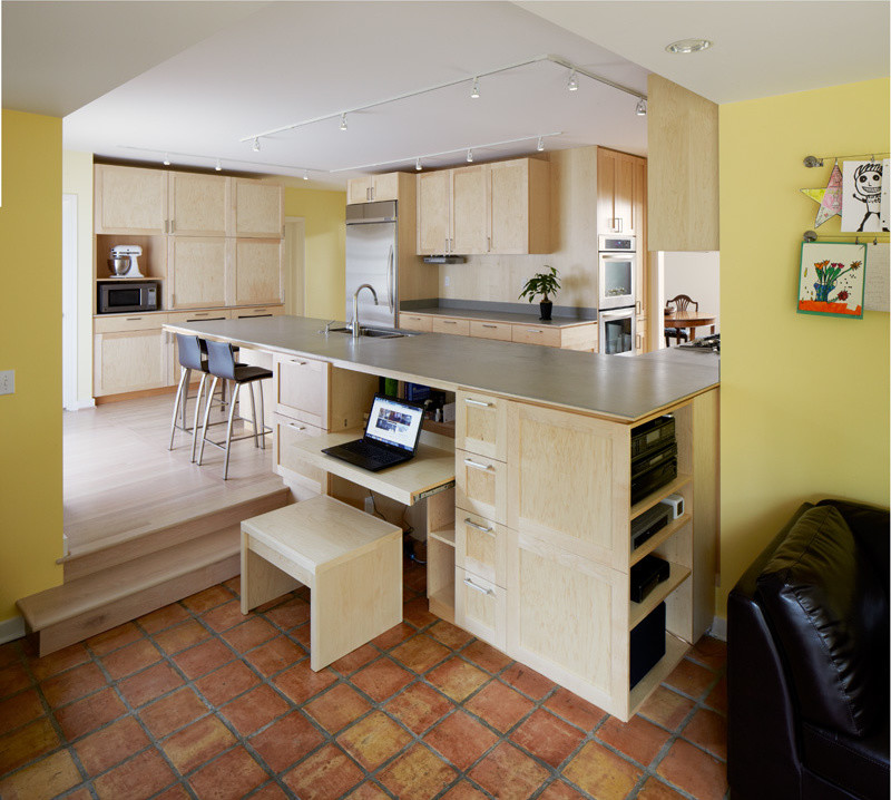 Example of a mid-sized transitional open concept terra-cotta tile kitchen design in Seattle with yellow walls, a standard fireplace, a plaster fireplace and a wall-mounted tv