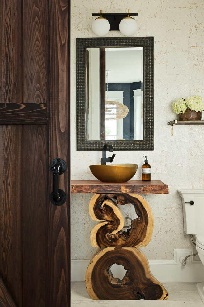 Bathroom - mid-sized coastal 3/4 beige floor and single-sink bathroom idea in Tampa with beige walls, a vessel sink, wood countertops, brown countertops and a freestanding vanity