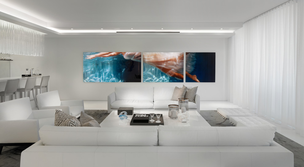 This is an example of a contemporary formal open concept living room in Miami with white walls and no fireplace.