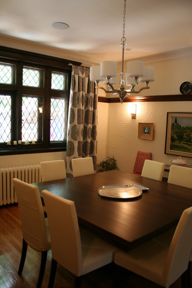 Mid-sized eclectic open plan dining in Montreal with beige walls and medium hardwood floors.