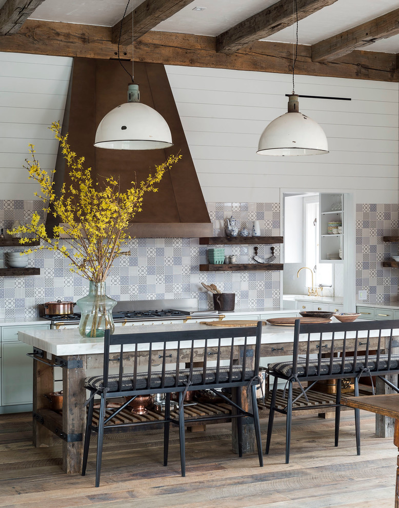 Inspiration for a transitional l-shaped open plan kitchen in Boston with marble benchtops, multi-coloured splashback, ceramic splashback, medium hardwood floors and with island.