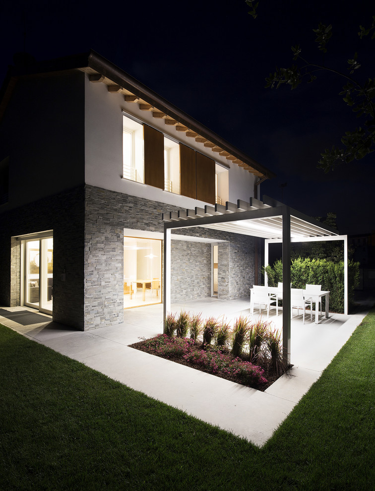 Ispirazione per giardino in estate With pavimentazioni in cemento