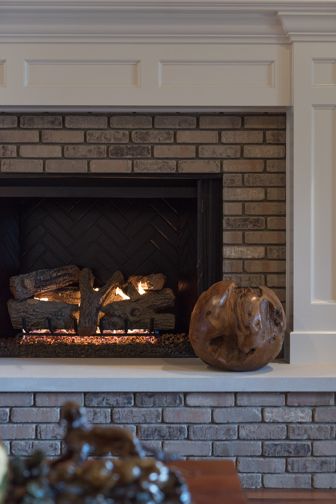 Example of a large transitional home design design