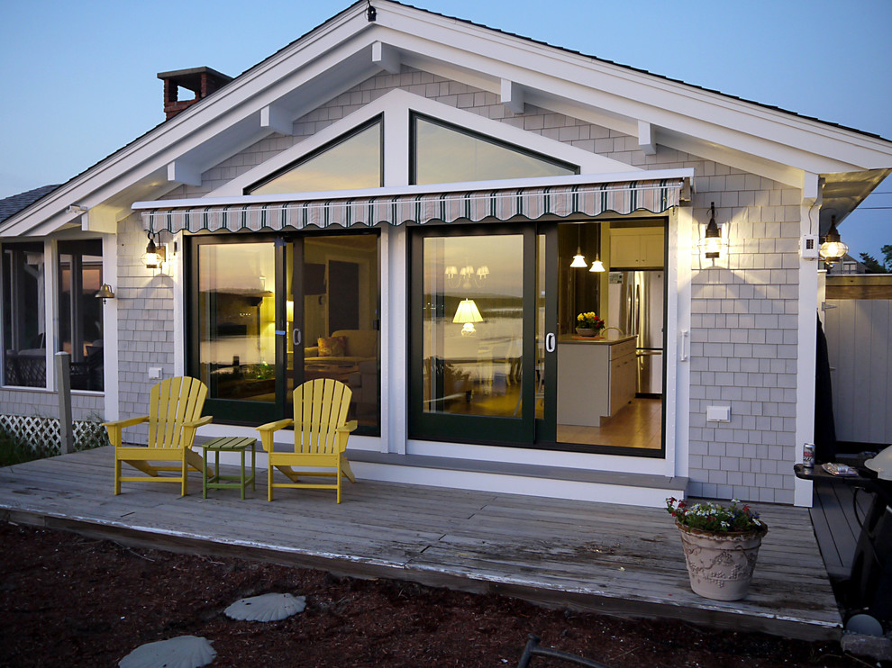 Design ideas for a small beach style one-storey exterior in Boston with wood siding.