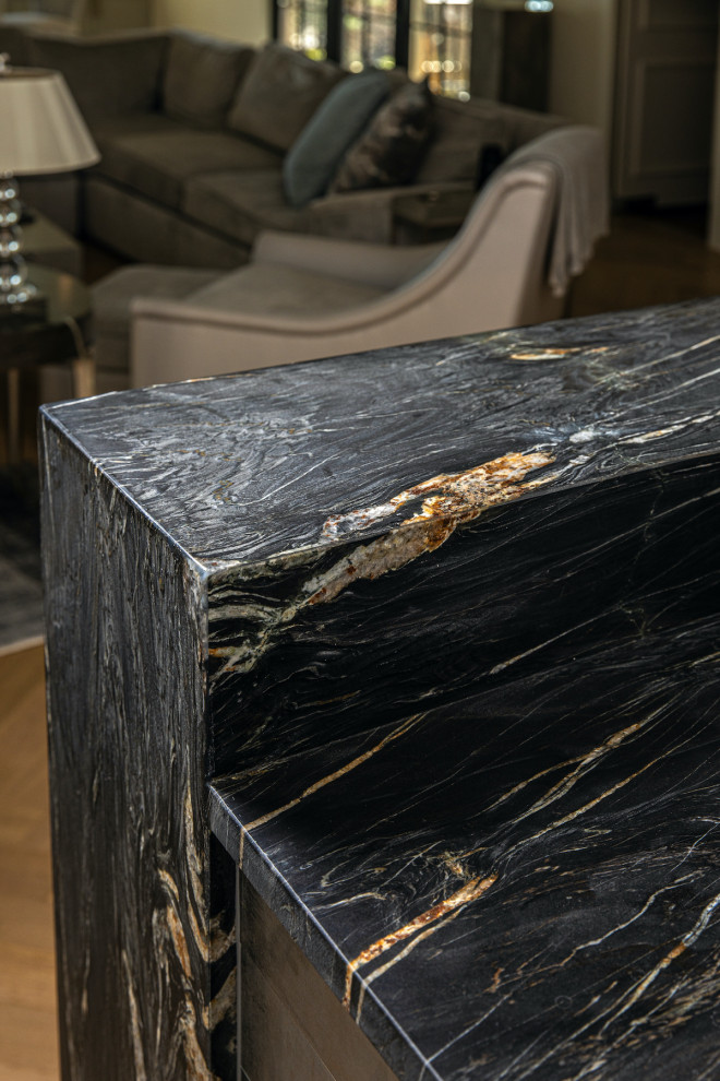 Inspiration for a contemporary home bar in Other with an undermount sink, quartzite benchtops and black benchtop.