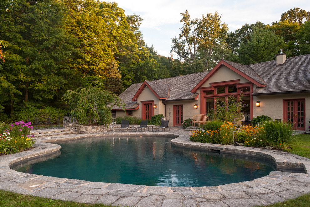 Design ideas for a traditional custom-shaped pool in New York.