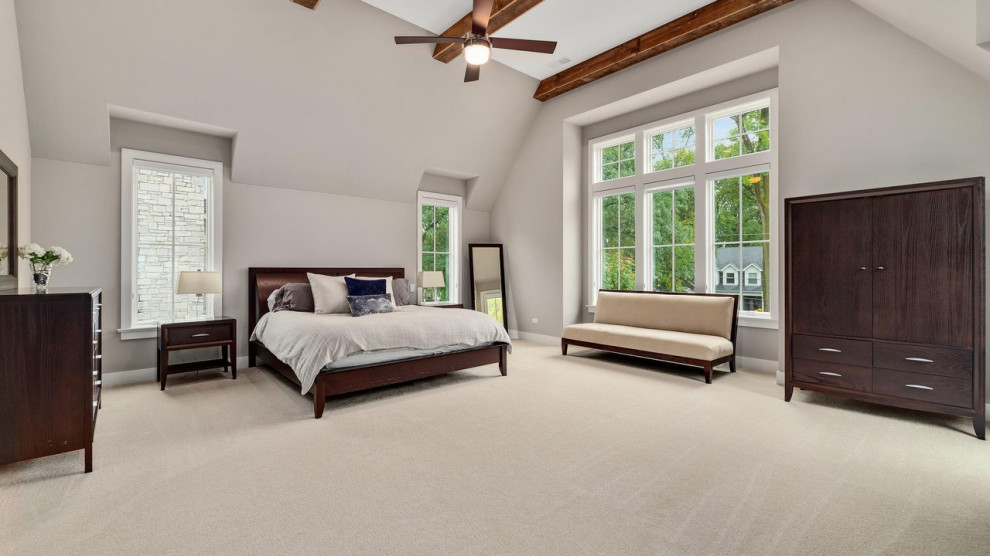 Example of a large country master ceramic tile and vaulted ceiling bedroom design in Chicago with gray walls