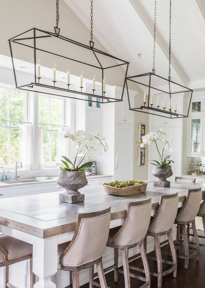 Inspiration for a transitional kitchen in Nashville with dark hardwood floors, white cabinets and with island.