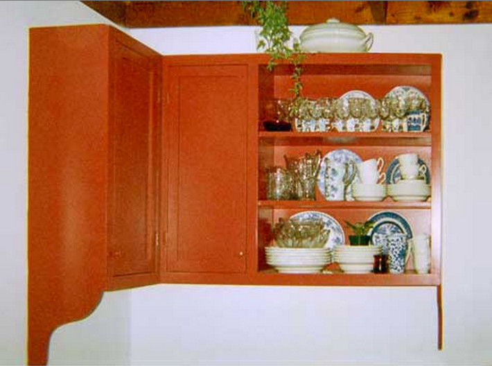 Kitchen photo in New York with recessed-panel cabinets and medium tone wood cabinets