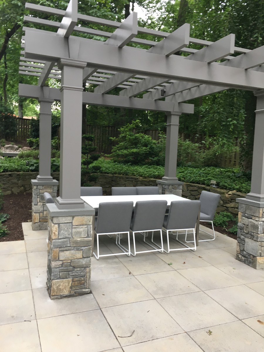 Inspiration for a contemporary backyard patio in DC Metro with concrete pavers and a pergola.