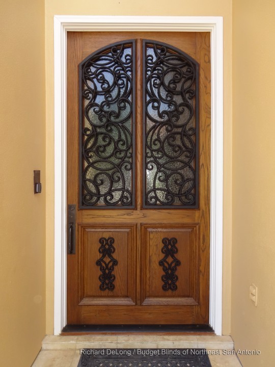 Inspiration for a mid-sized traditional front door in Dallas with beige walls, marble floors, a single front door and a medium wood front door.