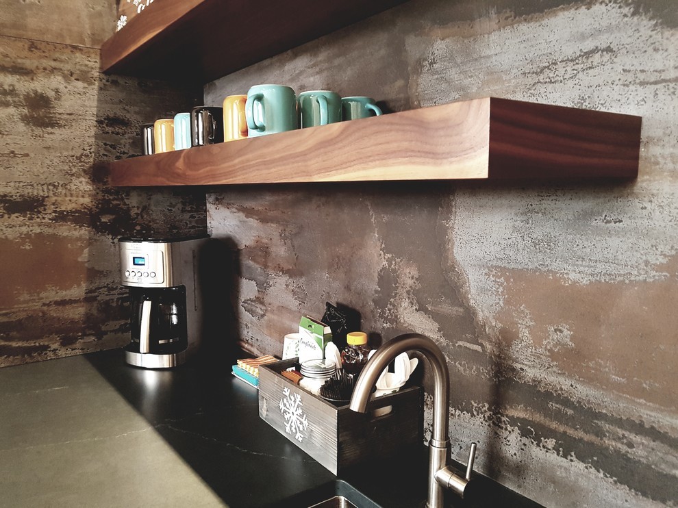 Example of a small mountain style single-wall kitchen design in Edmonton with quartz countertops