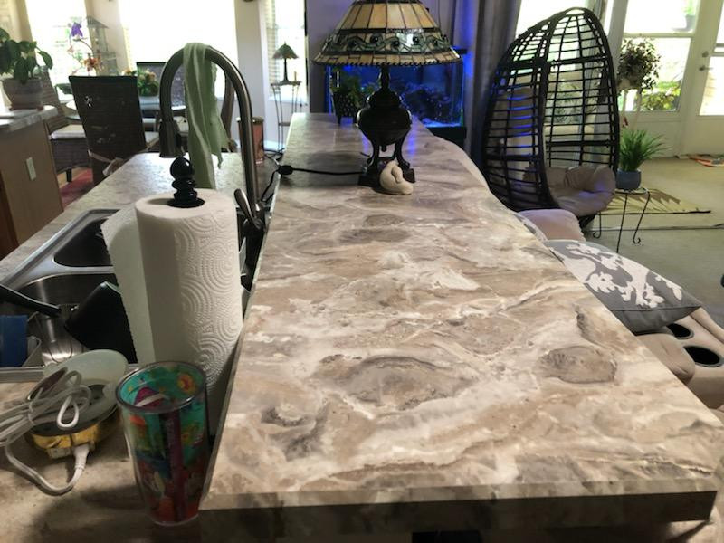 Inspiration for a mid-sized kitchen remodel with laminate countertops and gray countertops