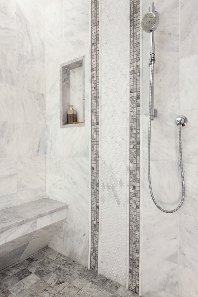 Inspiration for a large classic ensuite bathroom in Boston with flat-panel cabinets, dark wood cabinets, a double shower, a one-piece toilet, grey tiles, stone tiles, blue walls and marble flooring.