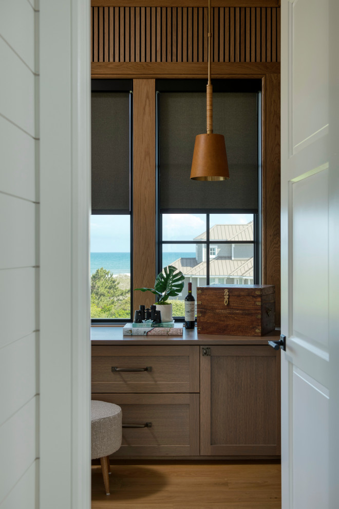 Beach style home design photo in Other