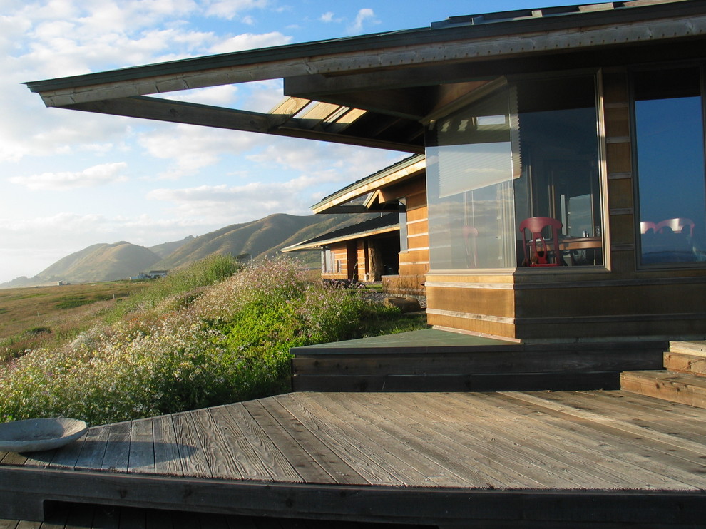 This is an example of a modern exterior in San Francisco with wood siding.