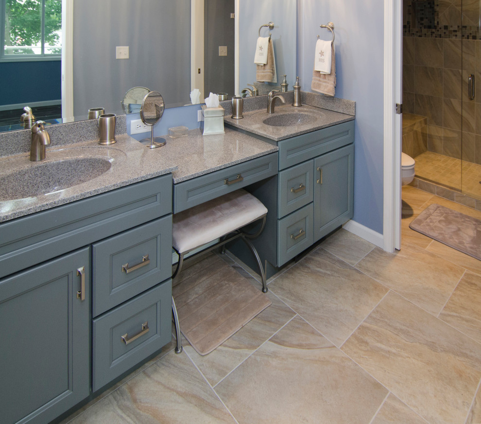 Bathroom - small transitional master porcelain tile, double-sink and beige floor bathroom idea in Other with recessed-panel cabinets, gray cabinets, blue walls, an integrated sink, solid surface countertops, gray countertops and a built-in vanity