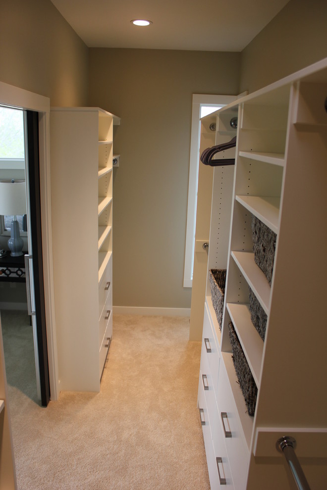 Photo of a contemporary storage and wardrobe in Calgary.