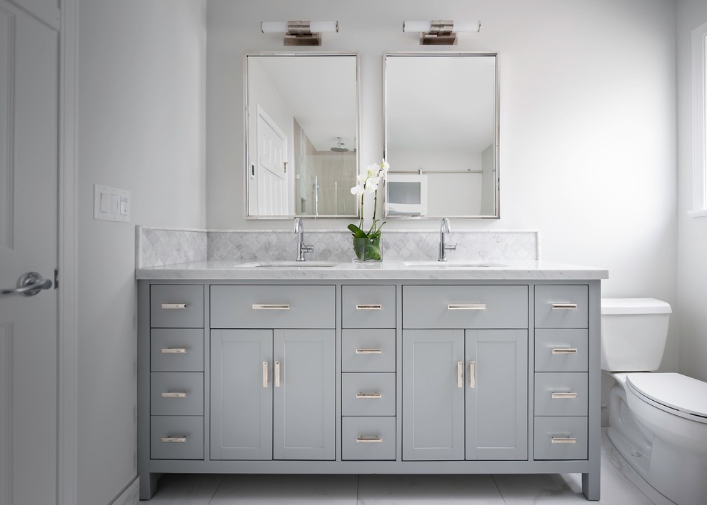 Design ideas for a contemporary 3/4 bathroom in Vancouver with recessed-panel cabinets, grey cabinets, a two-piece toilet, white tile, mosaic tile, grey walls, porcelain floors, engineered quartz benchtops, white floor, white benchtops, a double vanity and a built-in vanity.