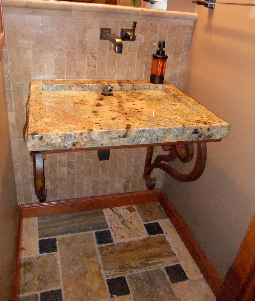 Home design - small rustic beige tile and travertine tile travertine floor and multicolored floor home design idea with beige walls, a wall-mount sink and granite countertops
