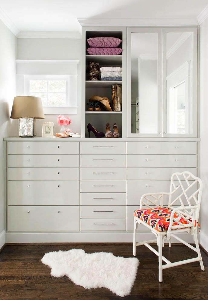 Design ideas for a mid-sized contemporary women's storage and wardrobe in Atlanta with flat-panel cabinets, white cabinets and dark hardwood floors.