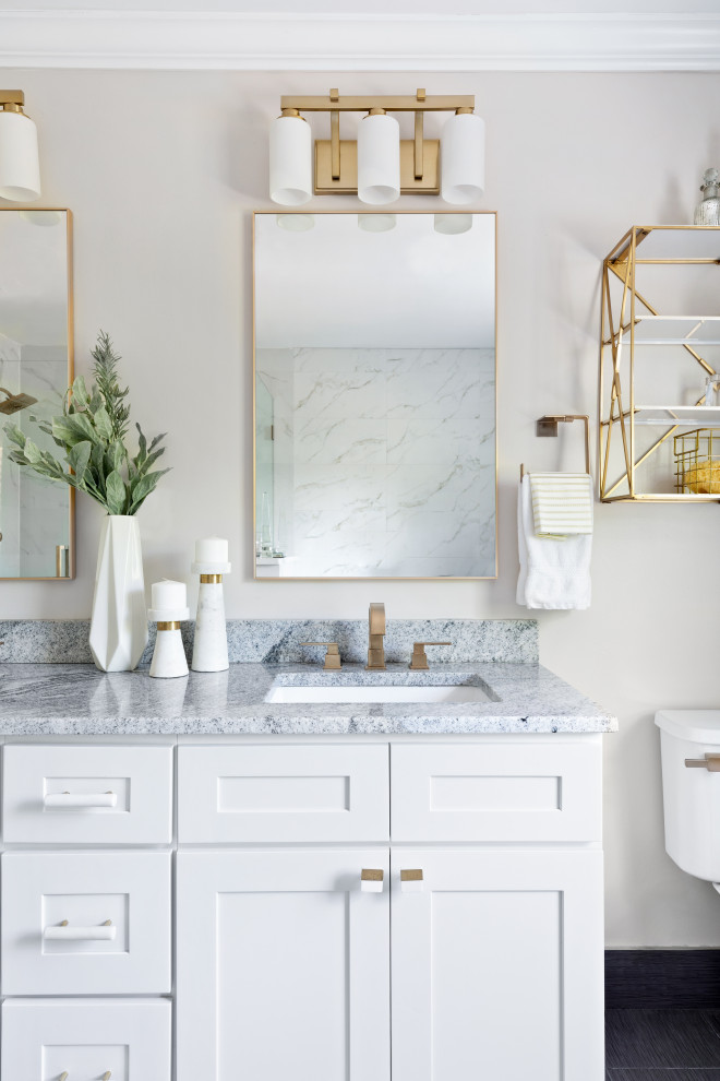 Inspiration for a transitional bathroom in New York with shaker cabinets, white cabinets, white walls, an undermount sink, grey floor and grey benchtops.