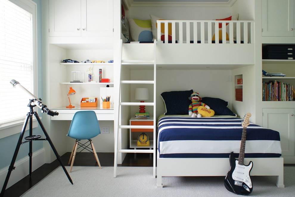 Design ideas for a mid-sized contemporary gender-neutral kids' bedroom for kids 4-10 years old in New York with white walls and dark hardwood floors.