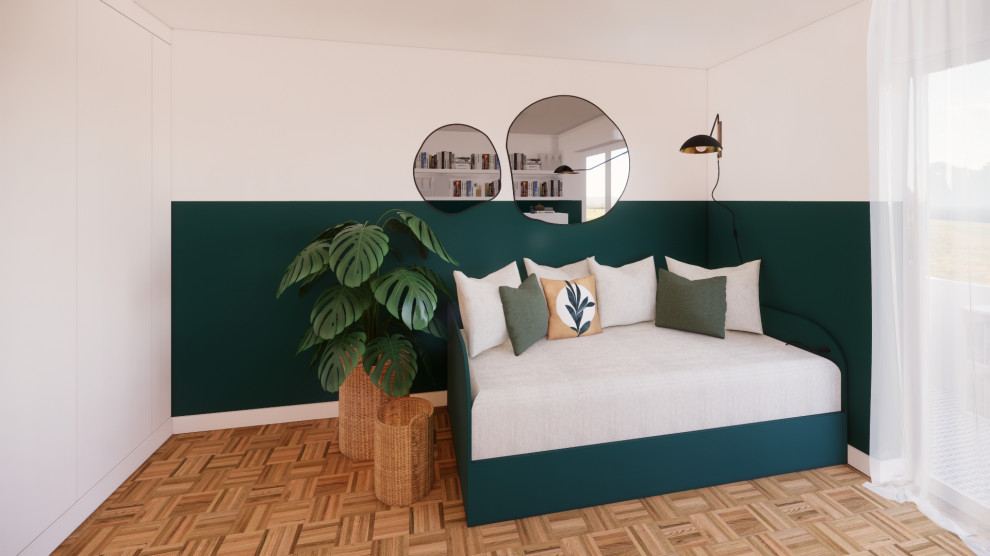 Foto di un piccolo atelier design con pareti verdi e pavimento in legno massello medio