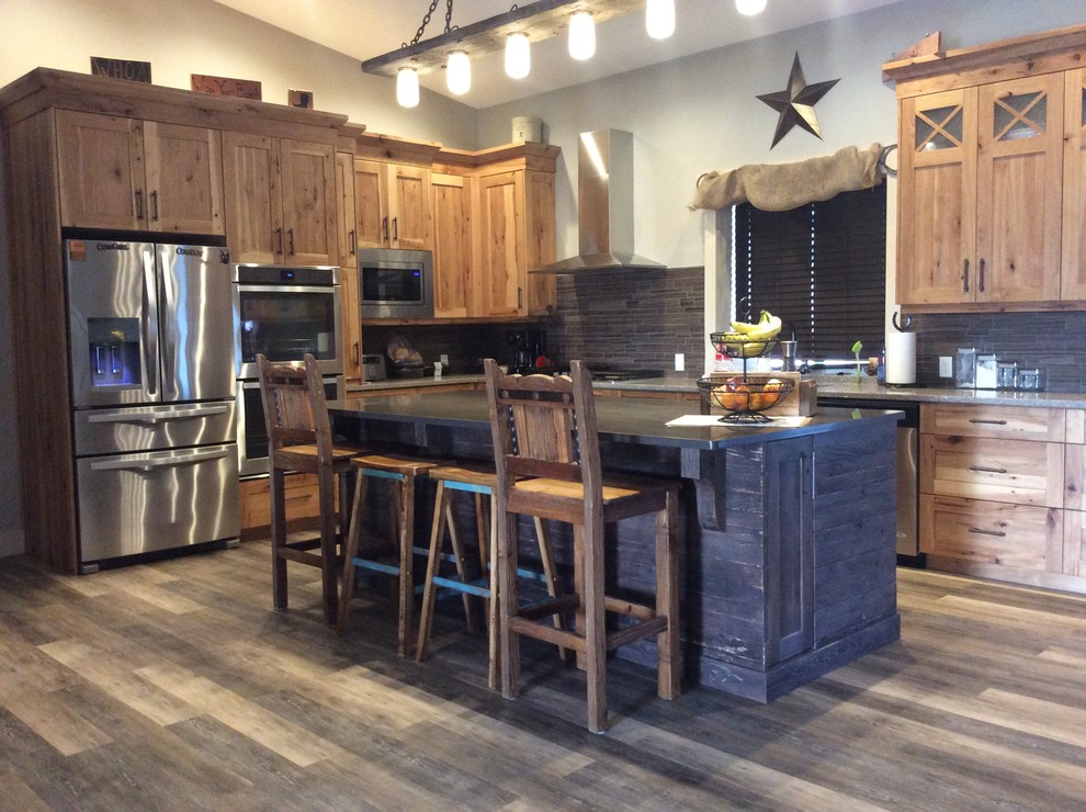 Example of a mountain style kitchen design in Calgary