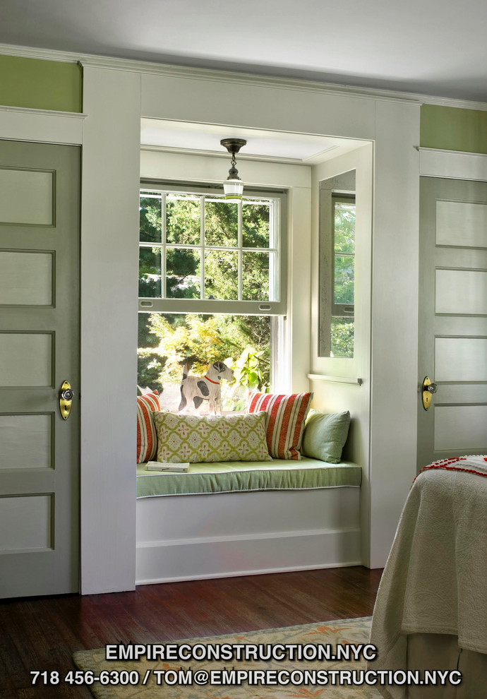 Inspiration for an expansive arts and crafts guest bedroom in New York with green walls and medium hardwood floors.