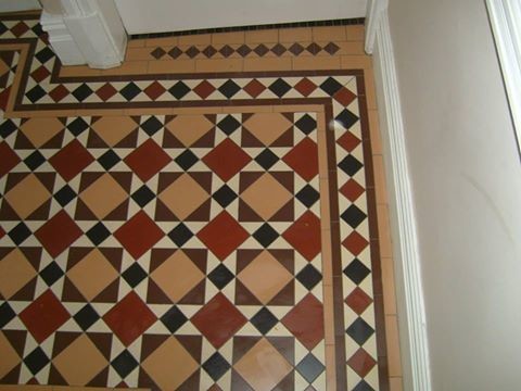 Inspiration for a traditional hallway in Perth with porcelain floors.