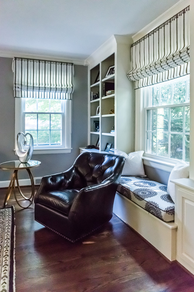 This is an example of a mid-sized contemporary formal enclosed living room in Raleigh with grey walls, dark hardwood floors, a standard fireplace, a stone fireplace surround and a wall-mounted tv.