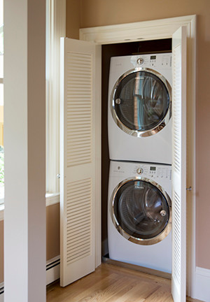 This is an example of a traditional laundry room in Boston.