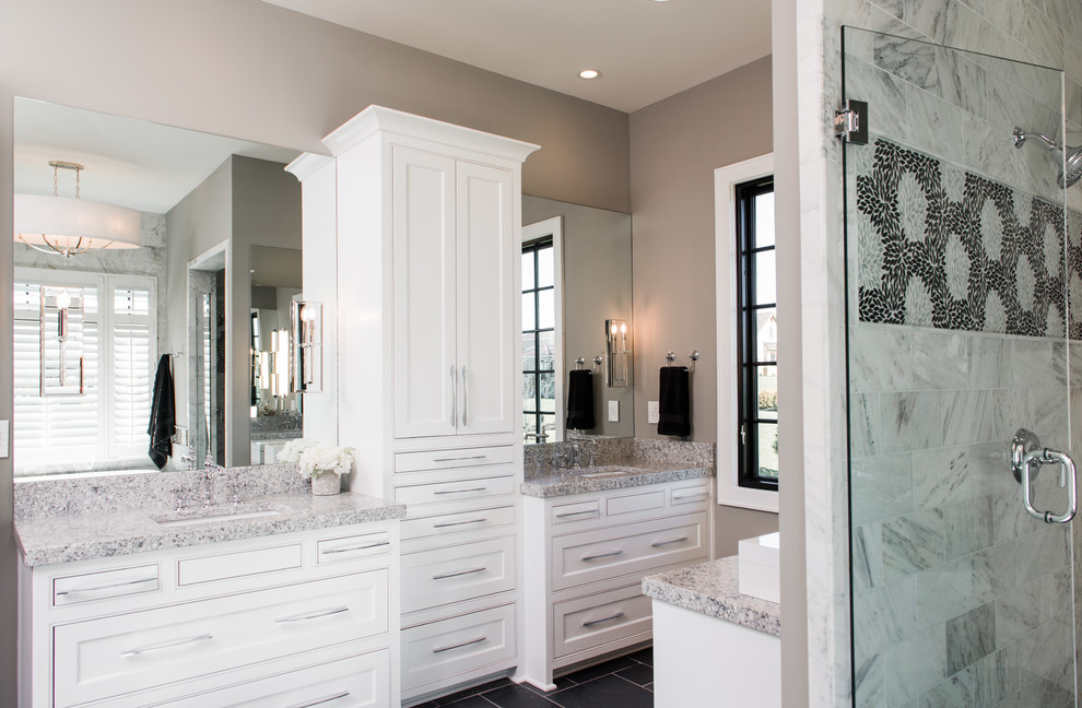 Inspiration for a mid-sized arts and crafts master bathroom in Kansas City with flat-panel cabinets, white cabinets, an alcove shower, a two-piece toilet, gray tile, stone tile, beige walls, slate floors, granite benchtops and an undermount sink.