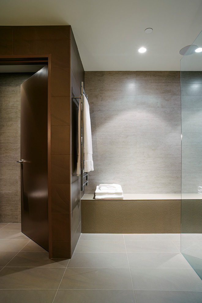 Photo of a mid-sized contemporary master bathroom in Vancouver with a vessel sink, flat-panel cabinets, light wood cabinets, engineered quartz benchtops, a freestanding tub, an open shower, gray tile, porcelain tile, grey walls and porcelain floors.