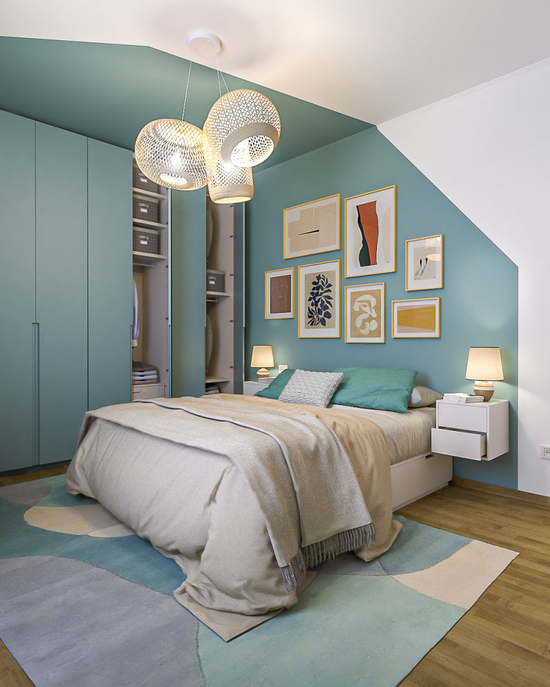 This is an example of a mid-sized contemporary master bedroom in Milan with multi-coloured walls and light hardwood floors.