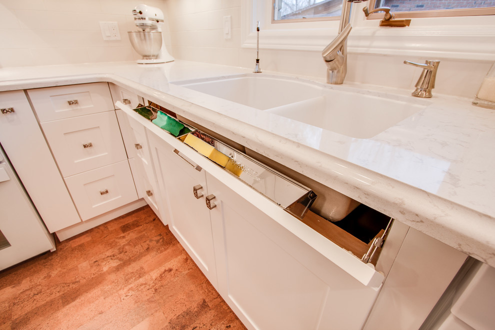 Mid-sized transitional kitchen photo in Toronto with recessed-panel cabinets, white cabinets, quartz countertops, stainless steel appliances and an island