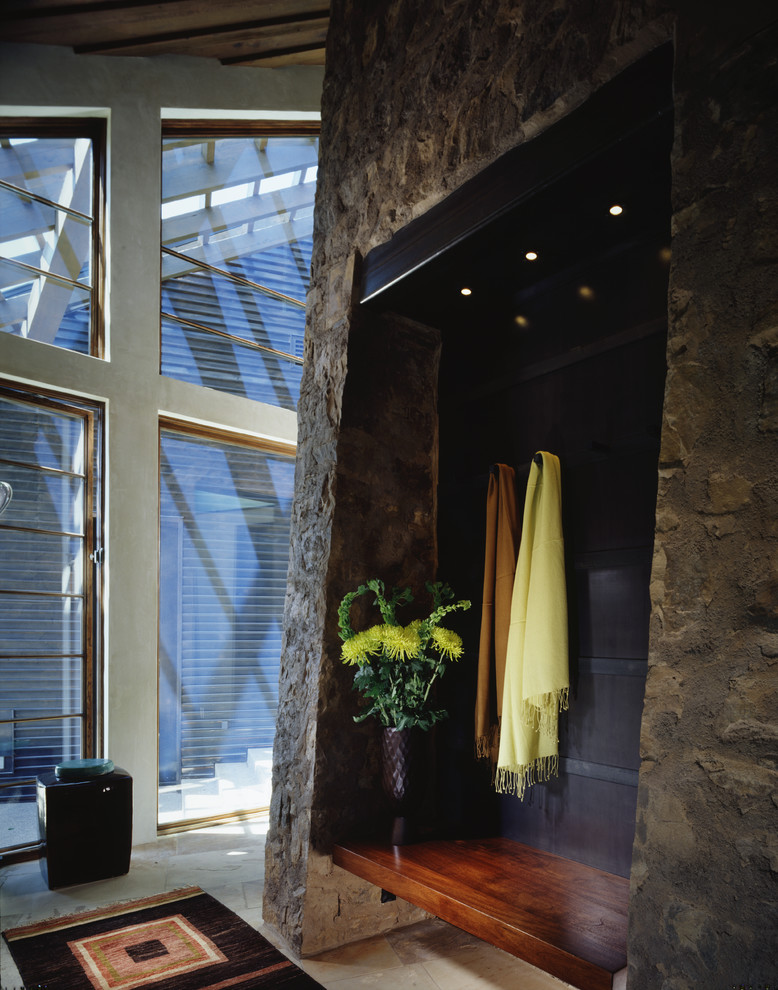 Example of a mountain style mudroom design in Denver