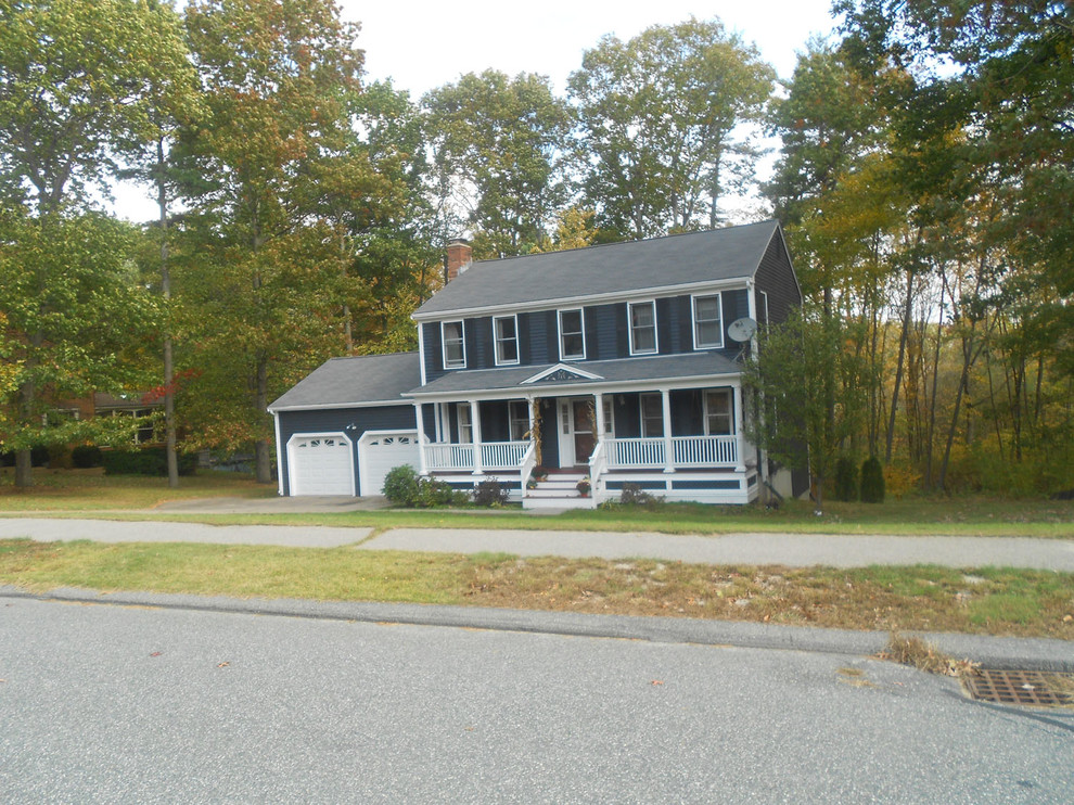Mid-sized transitional blue two-story concrete fiberboard exterior home photo in Boston