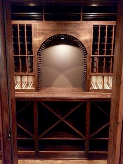 Small traditional wine cellar in Atlanta with storage racks.