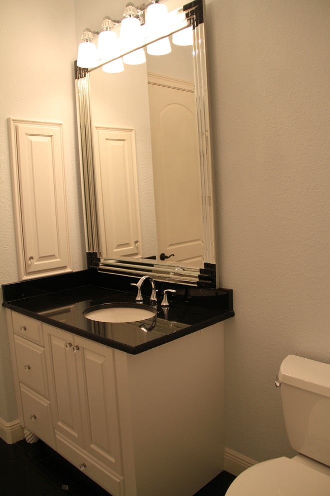 Mid-sized elegant master gray tile, white tile and marble tile alcove bathtub photo with raised-panel cabinets, white cabinets, white walls, an undermount sink and quartz countertops