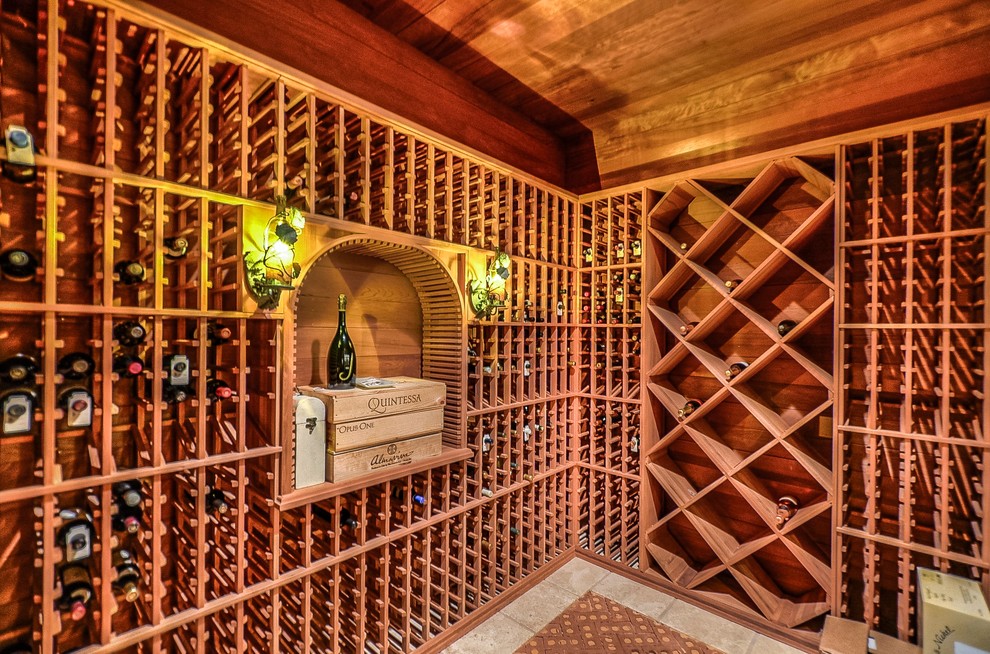 Photo of a traditional wine cellar in Charlotte with storage racks.