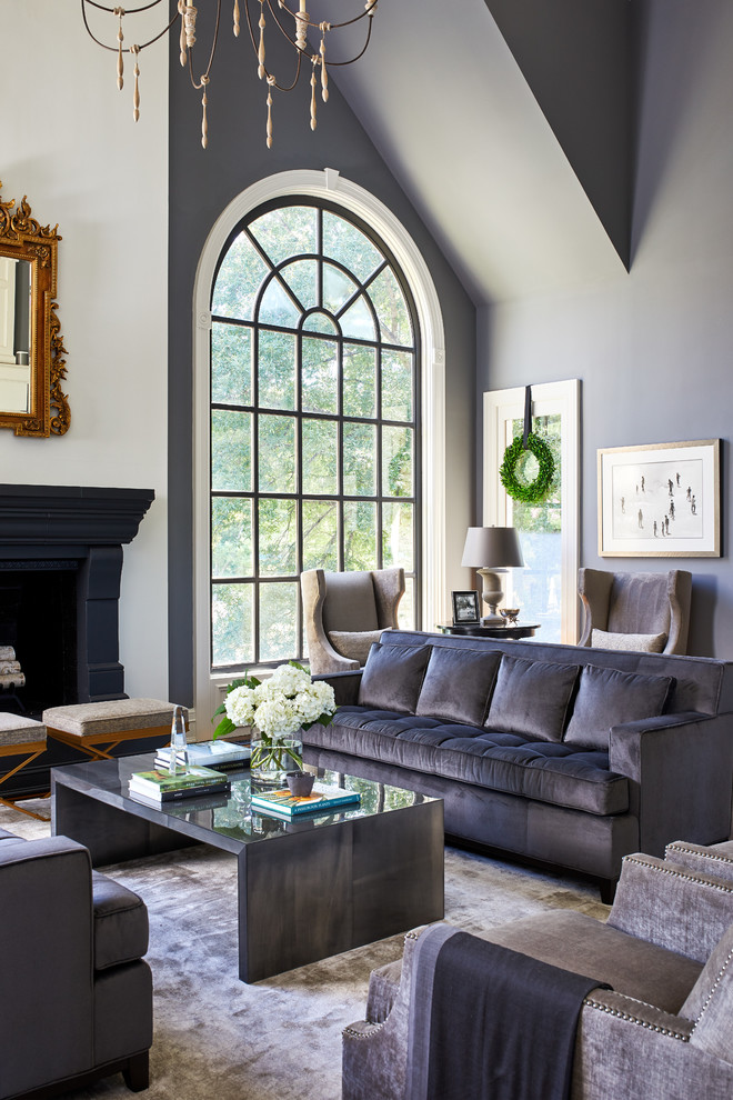 This is an example of an expansive transitional formal open concept living room in DC Metro with grey walls, a standard fireplace, no tv and dark hardwood floors.
